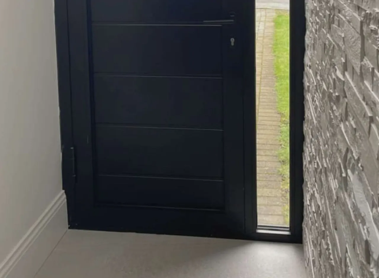 Contemporary aluminium entrance door and glazed side light